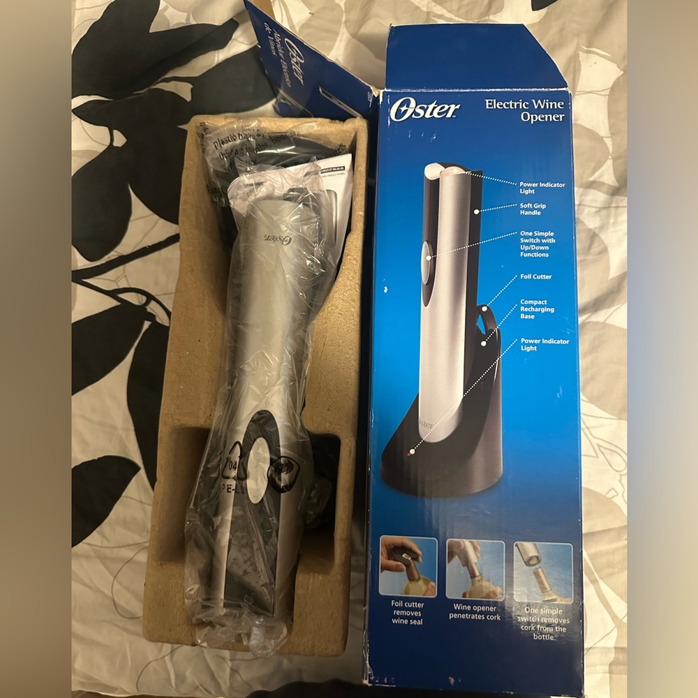 Brand new Oster Electric Wine Opener in sleek silver 🍷